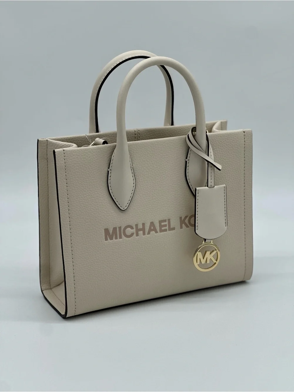Michael Kors Cream Pebbled Leather Satchel with Logo Strap